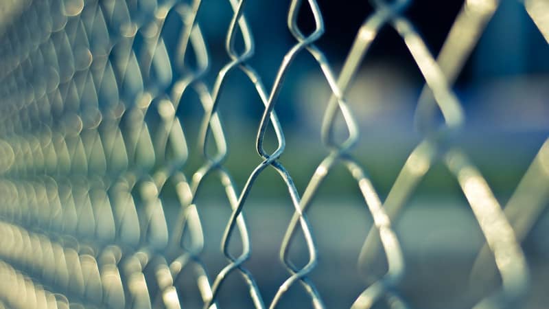 chainlink fence representing blockchain R&D