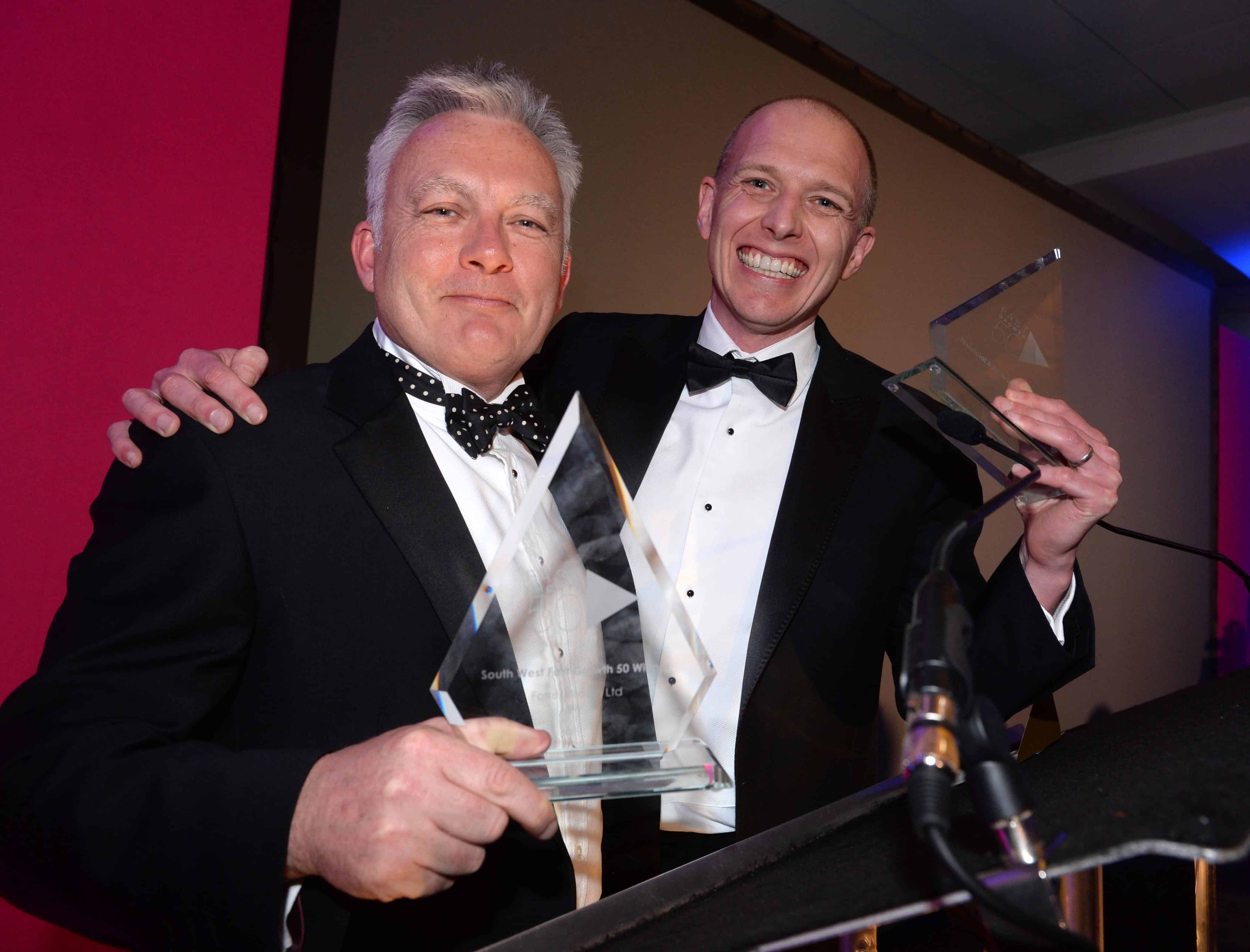 ForrestBrown’s Simon Brown and Mark Mason celebrating being voted number 1 fastest growing company in the South West.